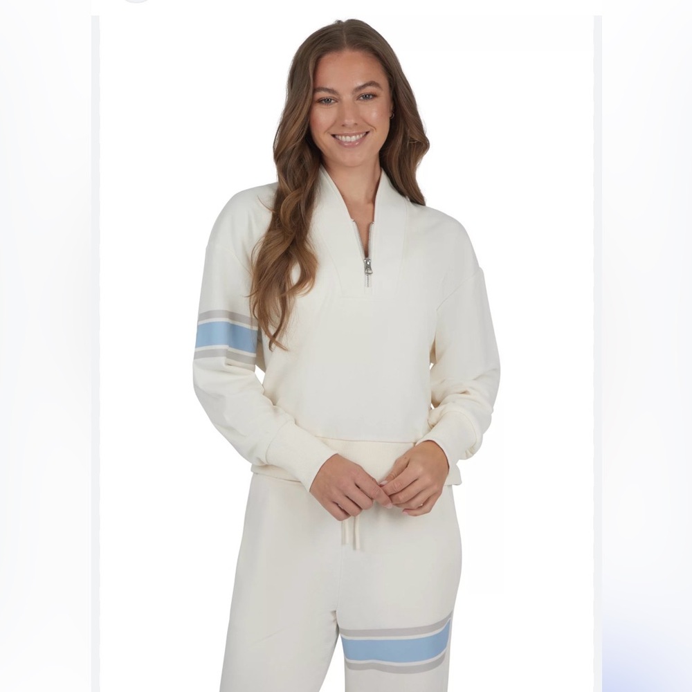 Yogalicious Cream and Blue Jumpsuit. New without tags!